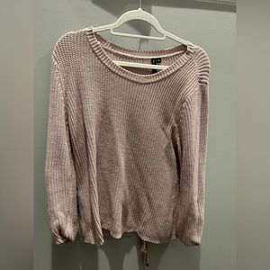 Light pink medium sweater with tie in back